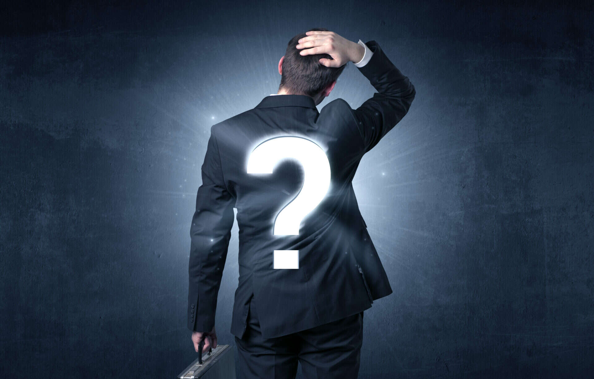 businessman standing and thinking about questions 2026 03 26 01 40 38 utc