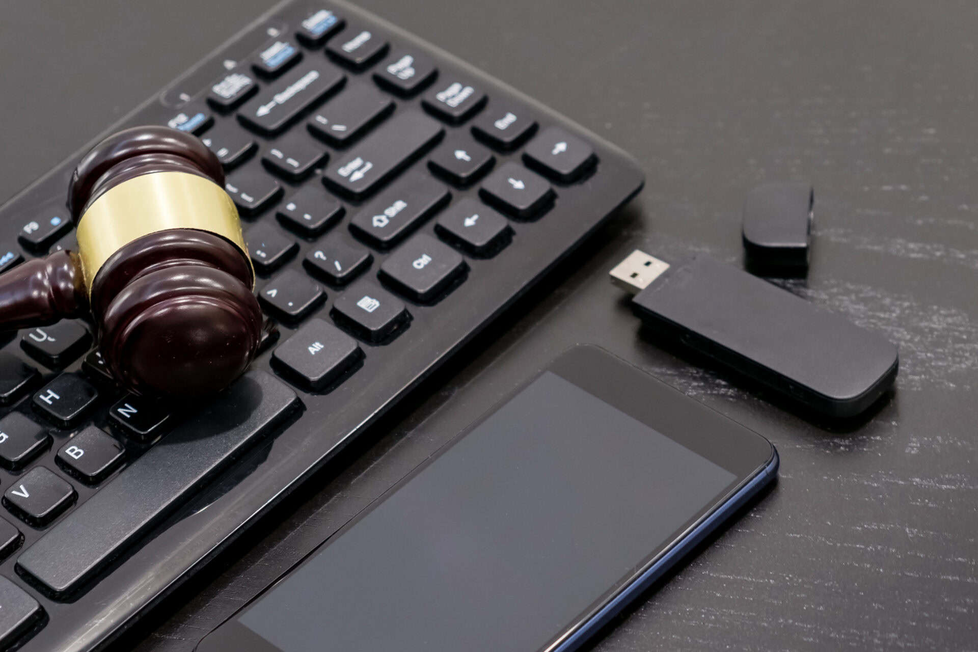 justice and law concept.lawyer workplace with laptop and documents with dark wooden table
