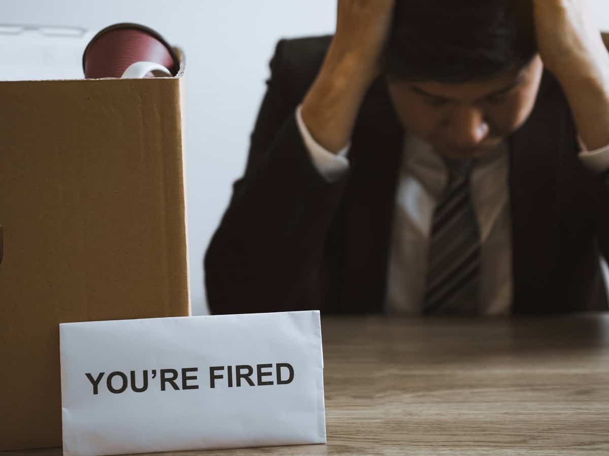 male employee is stressed or angry while he is fired from being