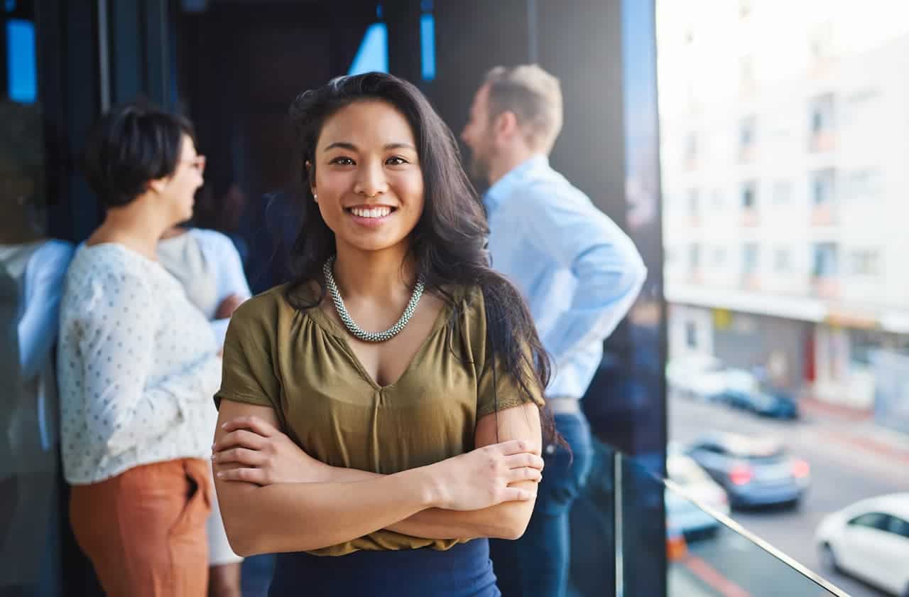 Asian woman smiling confidently